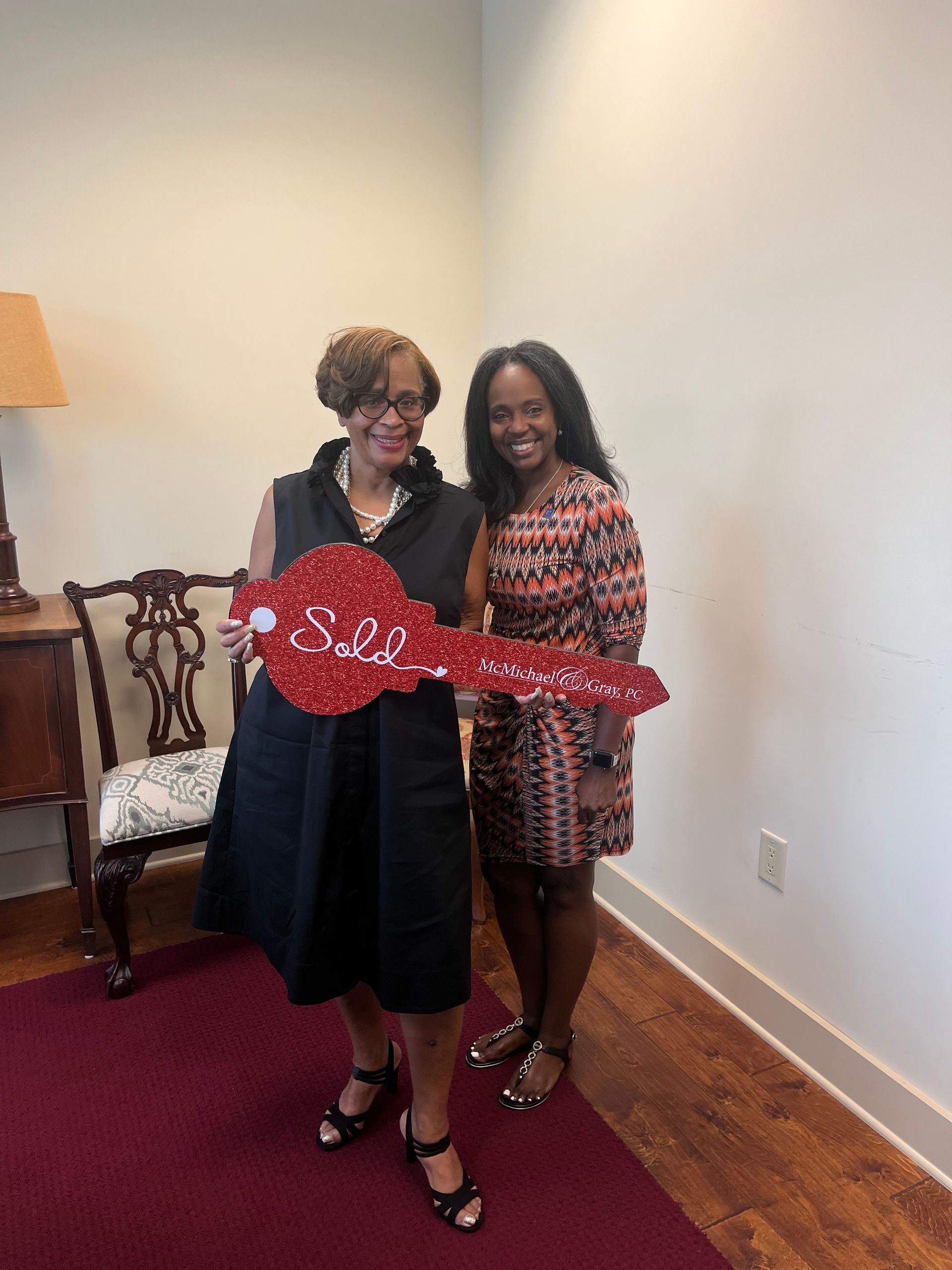 Rhonda Martin, Georgia Realtor with her client after closing.
