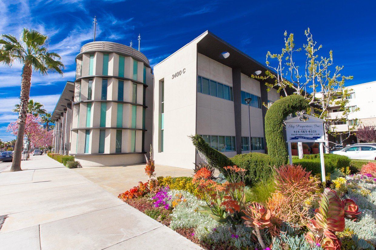 outdoor photo of Cahuenga Place apartments as shown from the landscaped angle