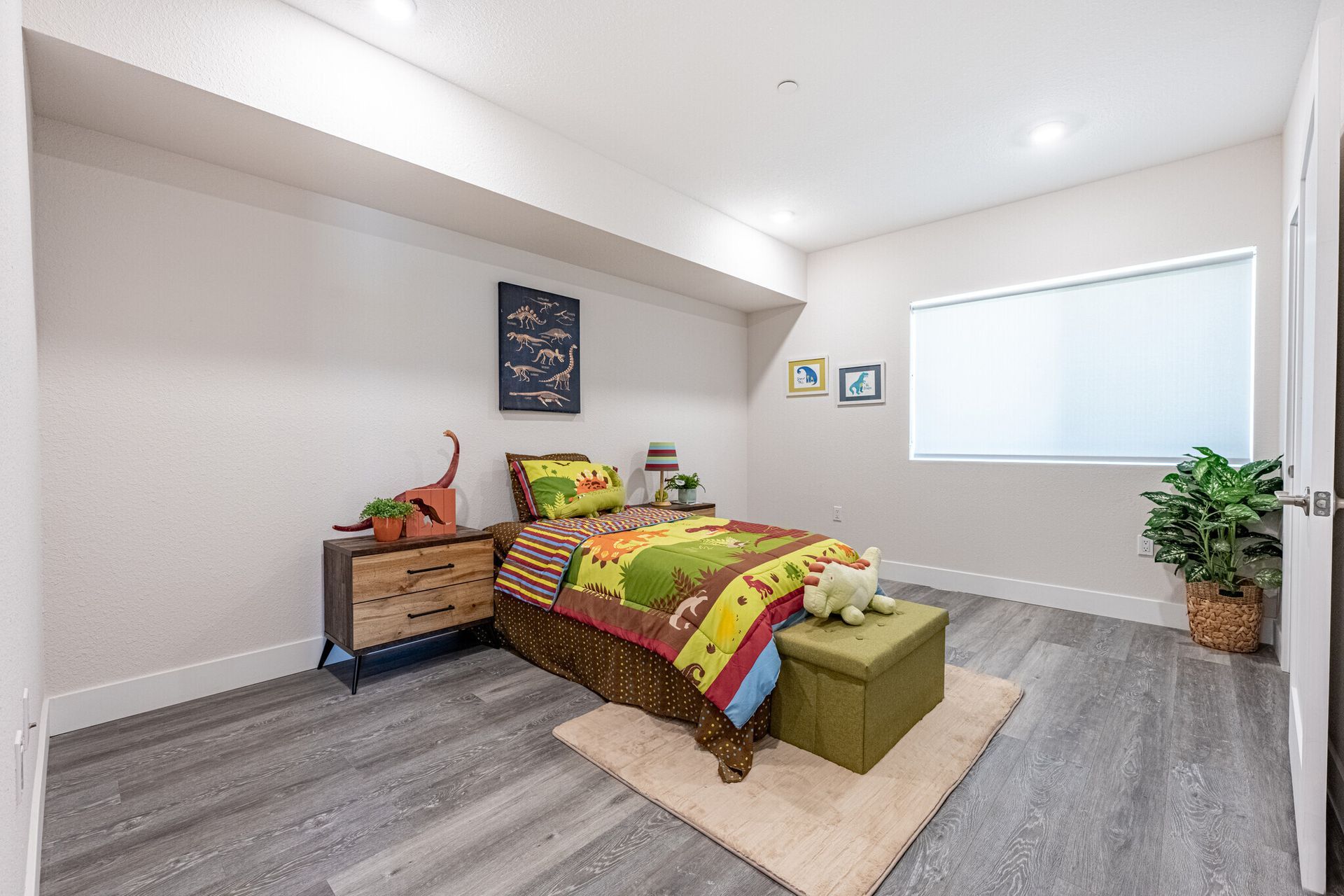 Second bedroom at The Secret at K-Town with large windows that create a bright, airy atmosphere in the apartment