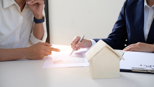 Client discussion with paperwork involved for housing. Property management in Toluca Lake, CA.