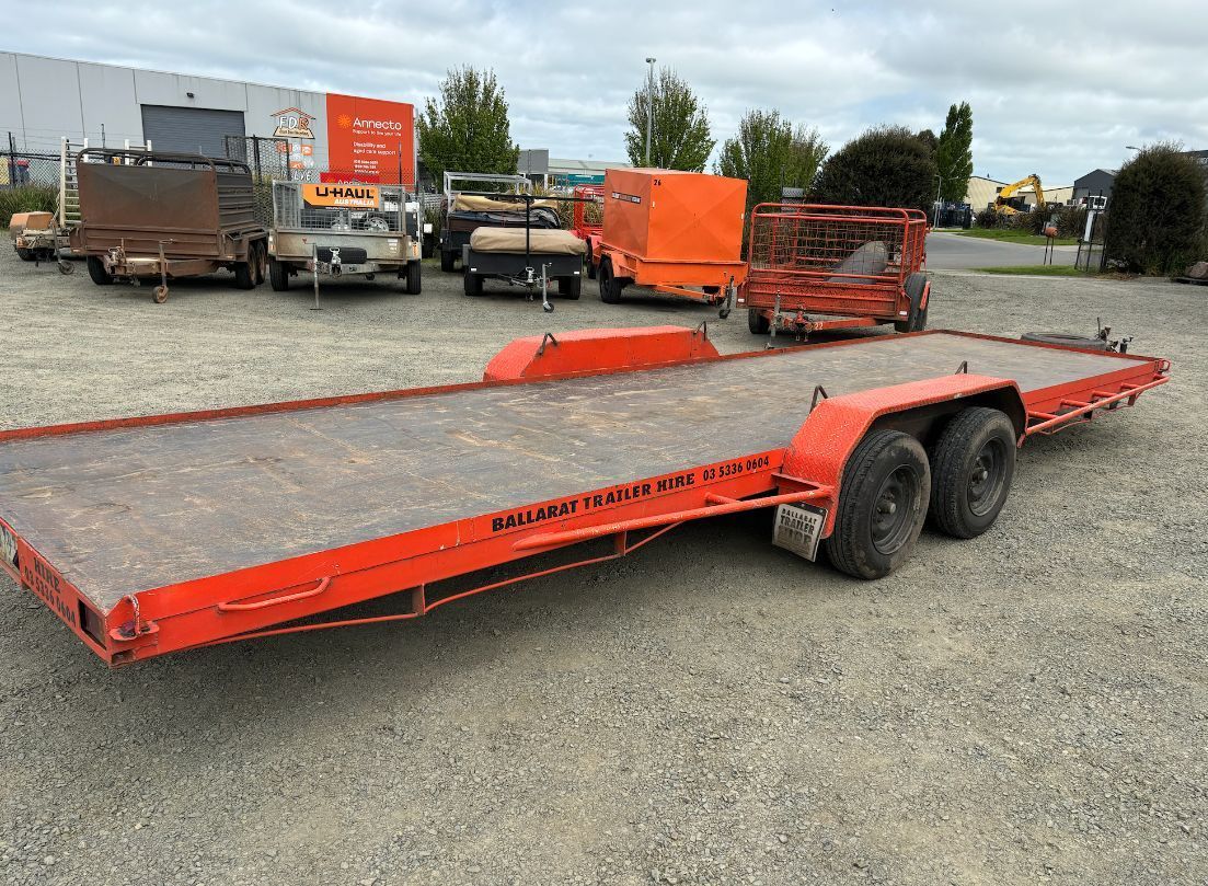 A Bunce of Silver Trailers Are Aligned Near a Parking Lot — Ballarat Trailer Hire in Alfredton, VIC