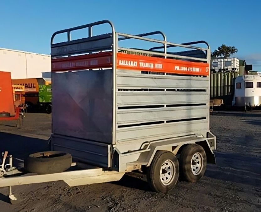 A Boat Trailer Parked on The Beach Near the Ocean — Ballarat Trailer Hire in Alfredton, VIC