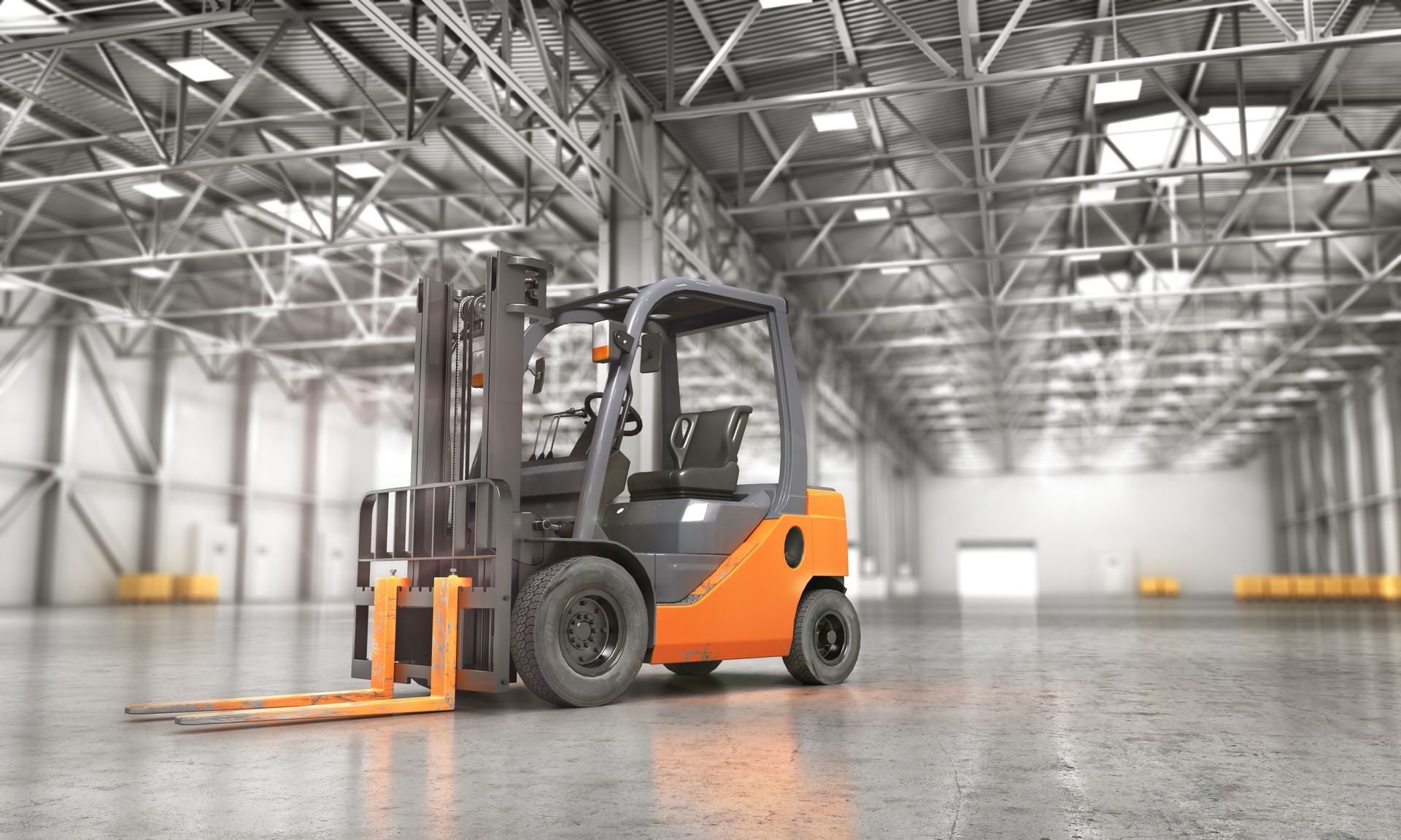 Black forklift in a bright warehouse with orange pallet forks and reflective floor