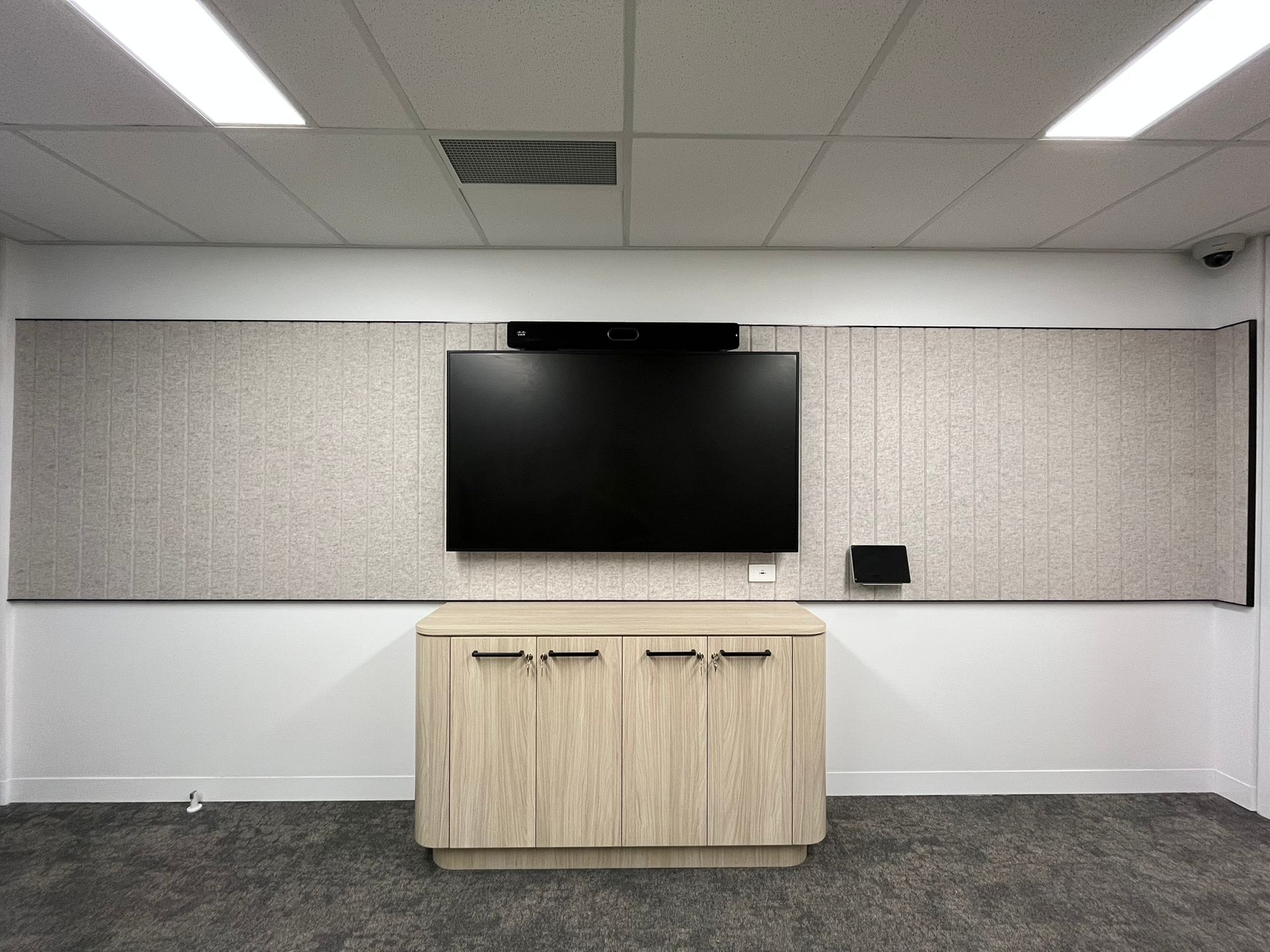 Conference Room with Tv and A Wooden Cabinet — Zeal Interiors & Joinery in South Grafton, NSW