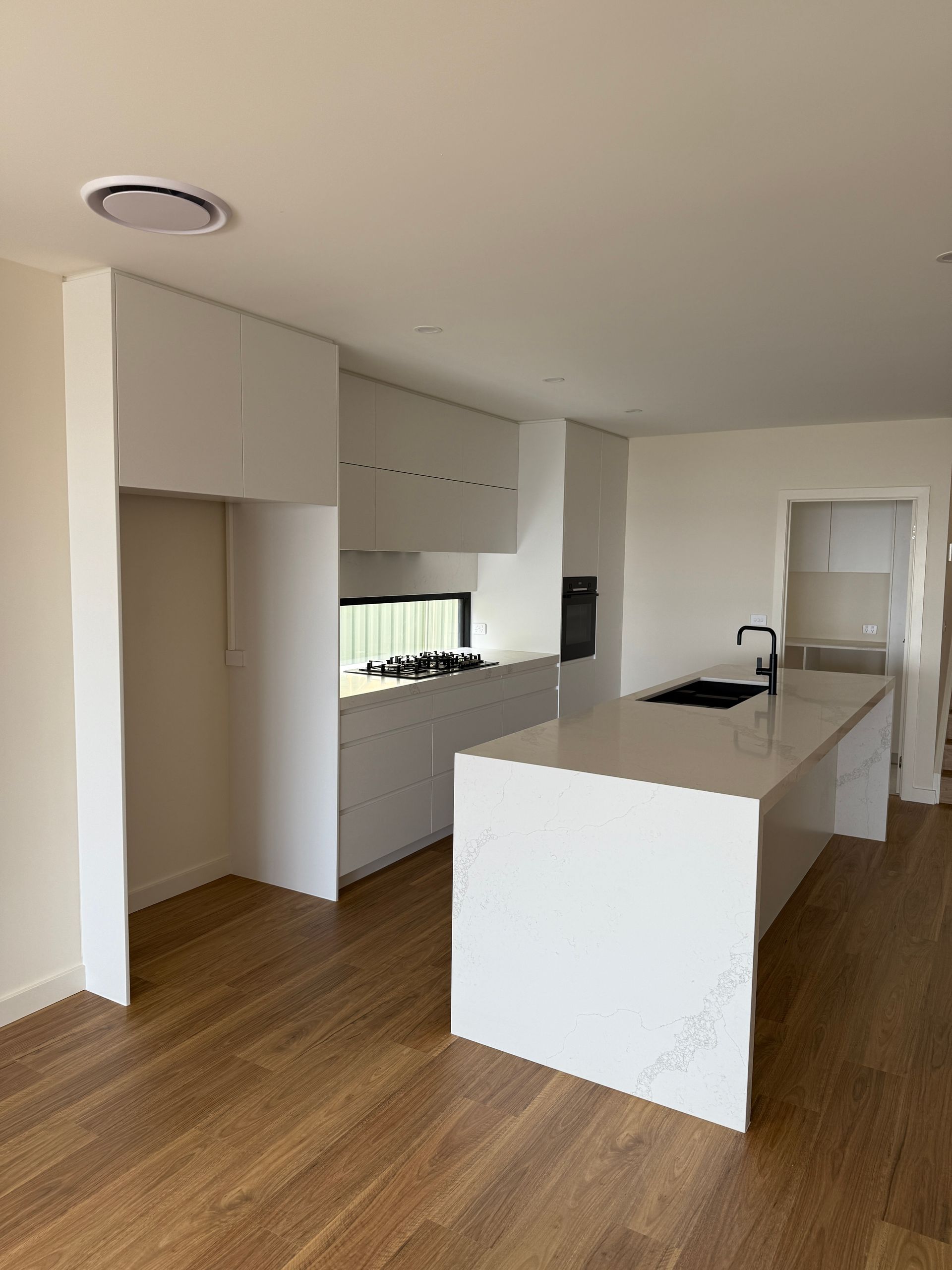 Modern White Kitchen with Island — Zeal Interiors in Sydney, NSW