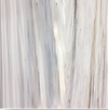 White and light gray marble with vertical veining.