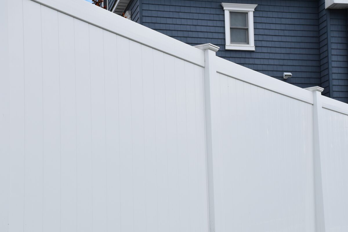 Classic white vinyl privacy fence
