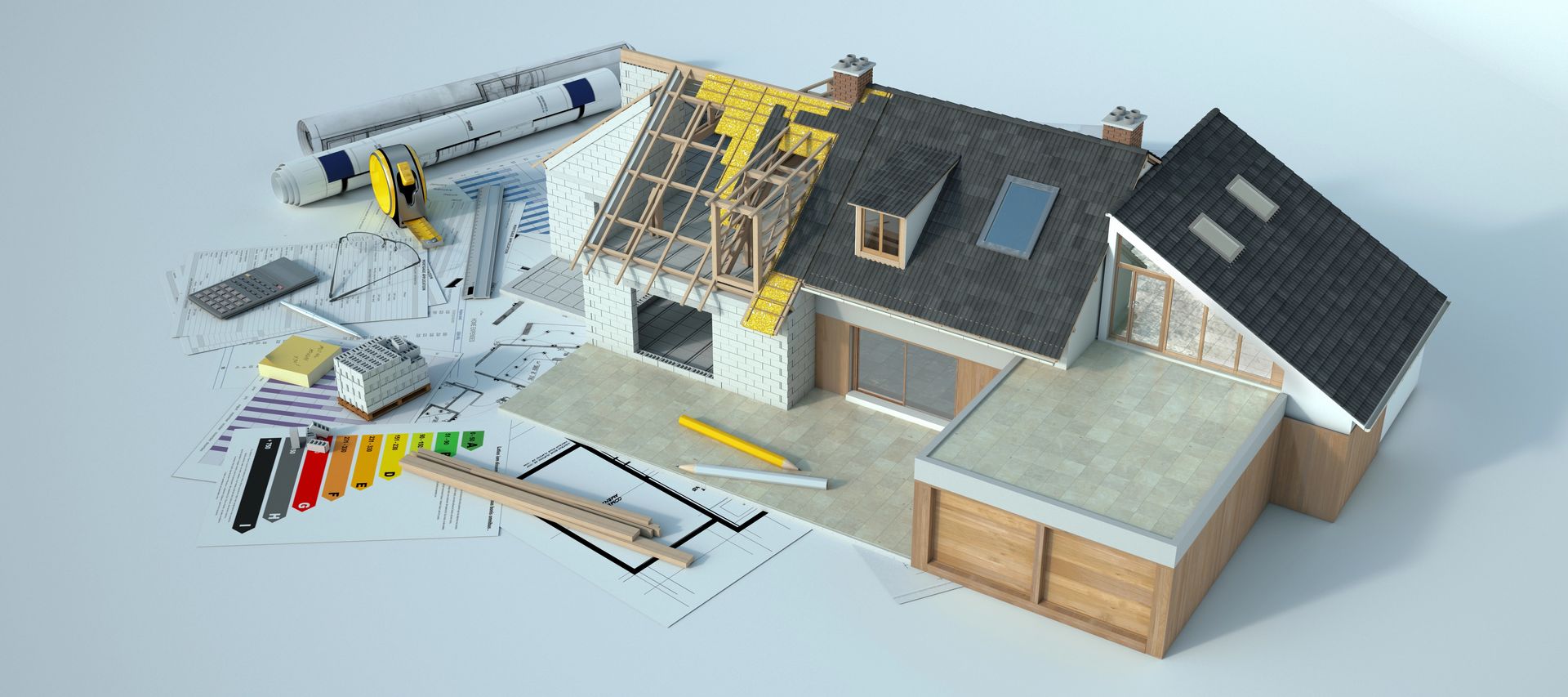 Huis in aanbouw met bouwtekeningen, gereedschap en energielabel.