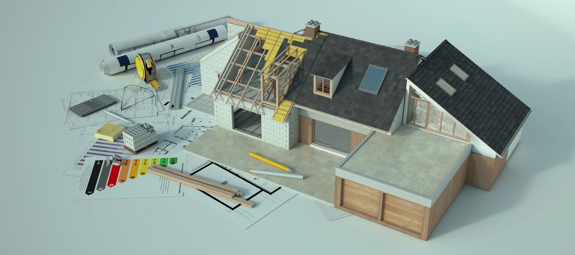 Model van een huis in aanbouw, met bouwtekeningen en gereedschap.