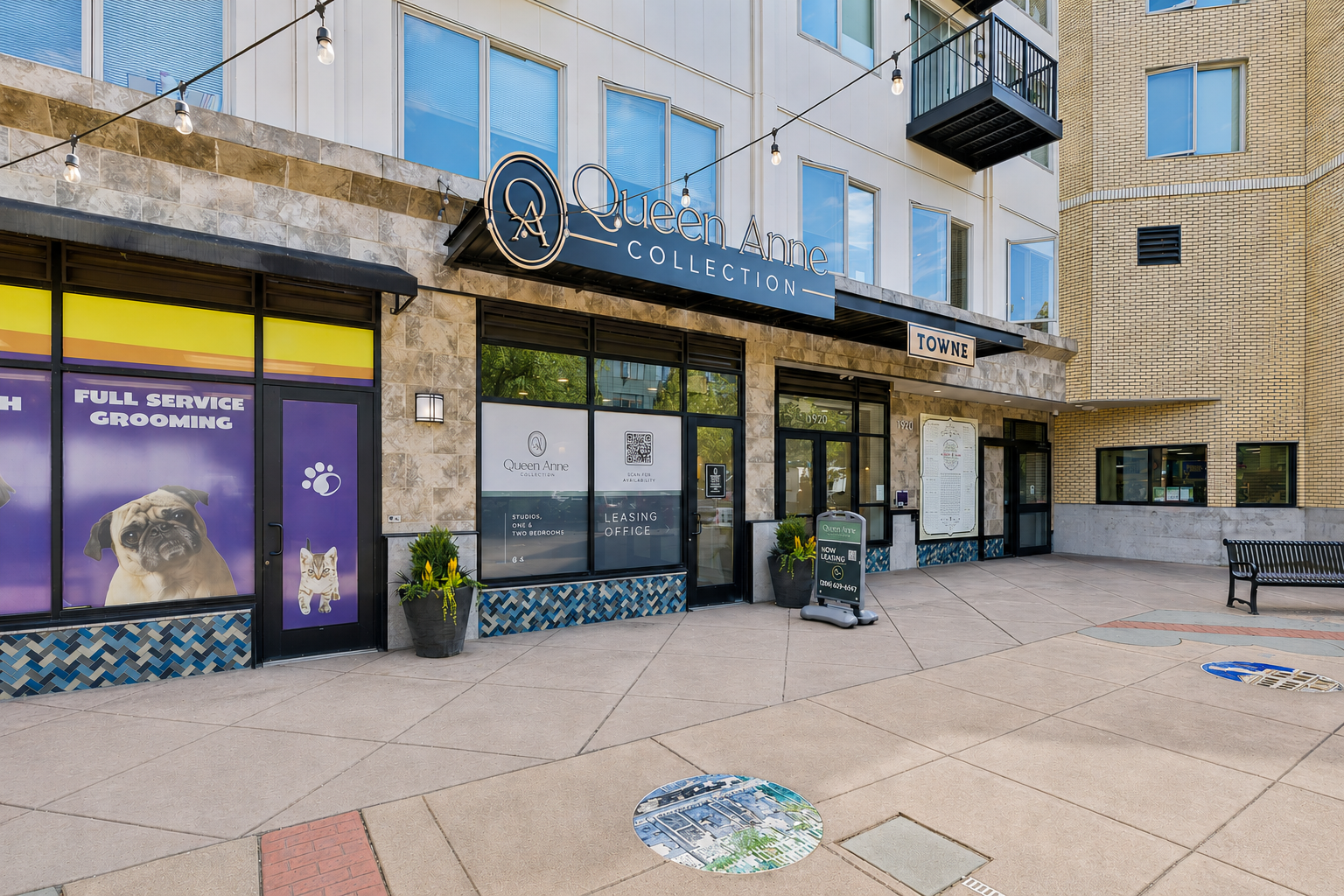 Exterior front entrance of queen anne collection leasing office and pet grooming