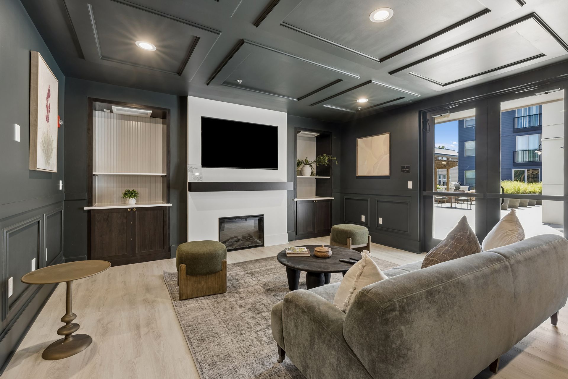 media room a queen anne collection with tv and fireplace