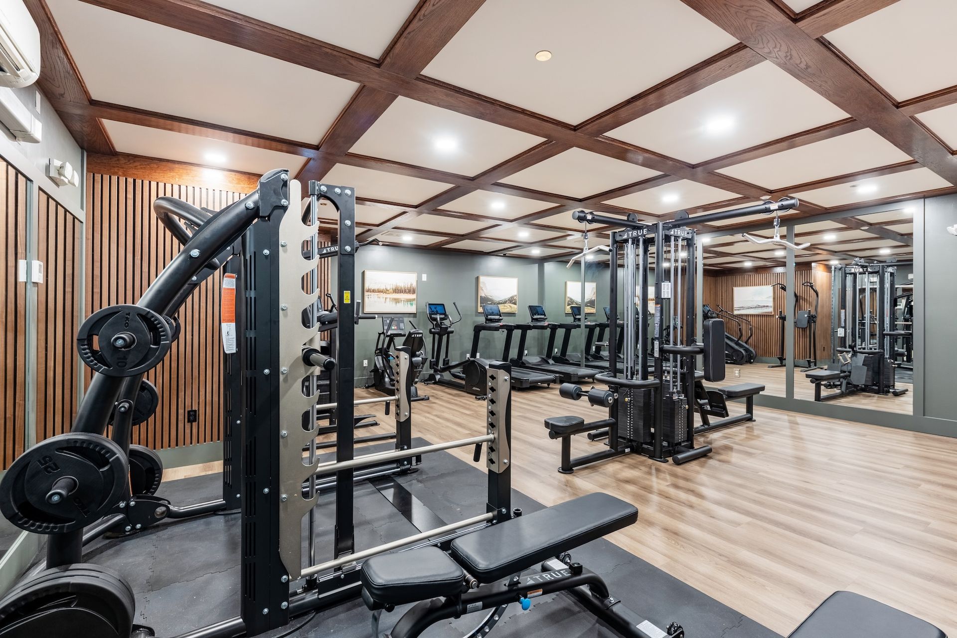 gym with free weights and squat rack