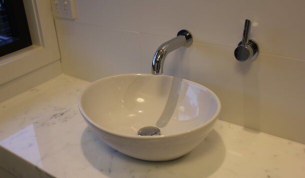Floating White Bathroom Sink — Craig Allman Construction Pty Ltd In Fernhill, NSW