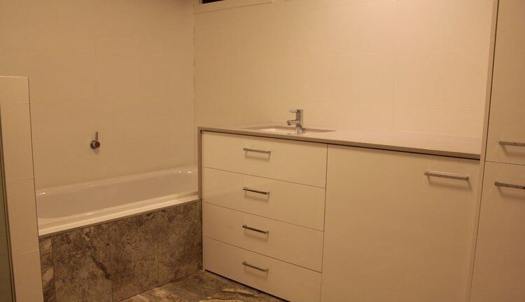 Bathroom Vanity & Bath — Craig Allman Construction Pty Ltd In Fernhill, NSW