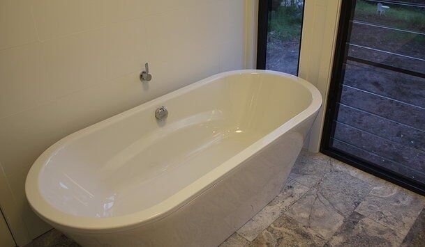 White Bath Tub — Craig Allman Construction Pty Ltd In Fernhill, NSW