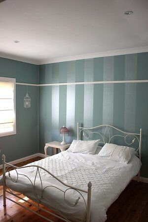 Bedroom with Wallpaper — Craig Allman Construction Pty Ltd In Fernhill, NSW