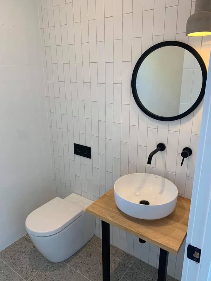A Bathroom With a Toilet — Craig Allman Construction Pty Ltd In Fernhill, NSW