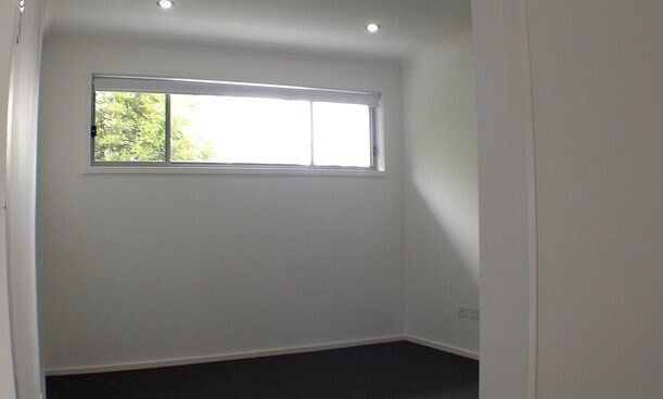 Empty Room With White Walls — Craig Allman Construction Pty Ltd In Fernhill, NSW