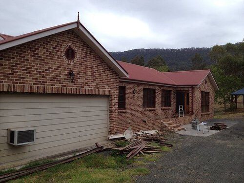 House With White Garage — Craig Allman Construction Pty Ltd In Fernhill, NSW