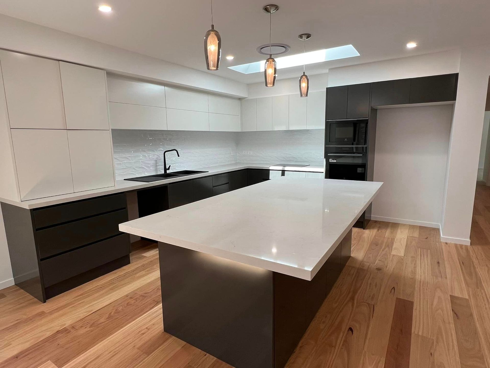 There is a Large Island in the Middle of the Kitchen — Craig Allman Construction Pty Ltd In Fernhill, NSW