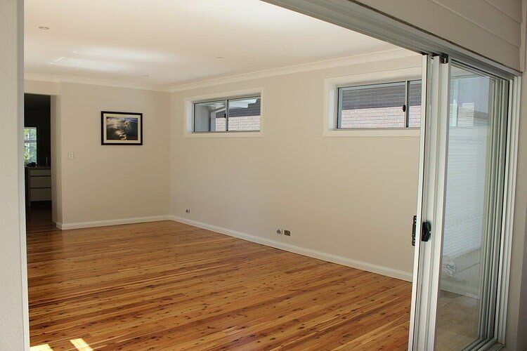 Empty Living Room — Craig Allman Construction Pty Ltd In Fernhill, NSW