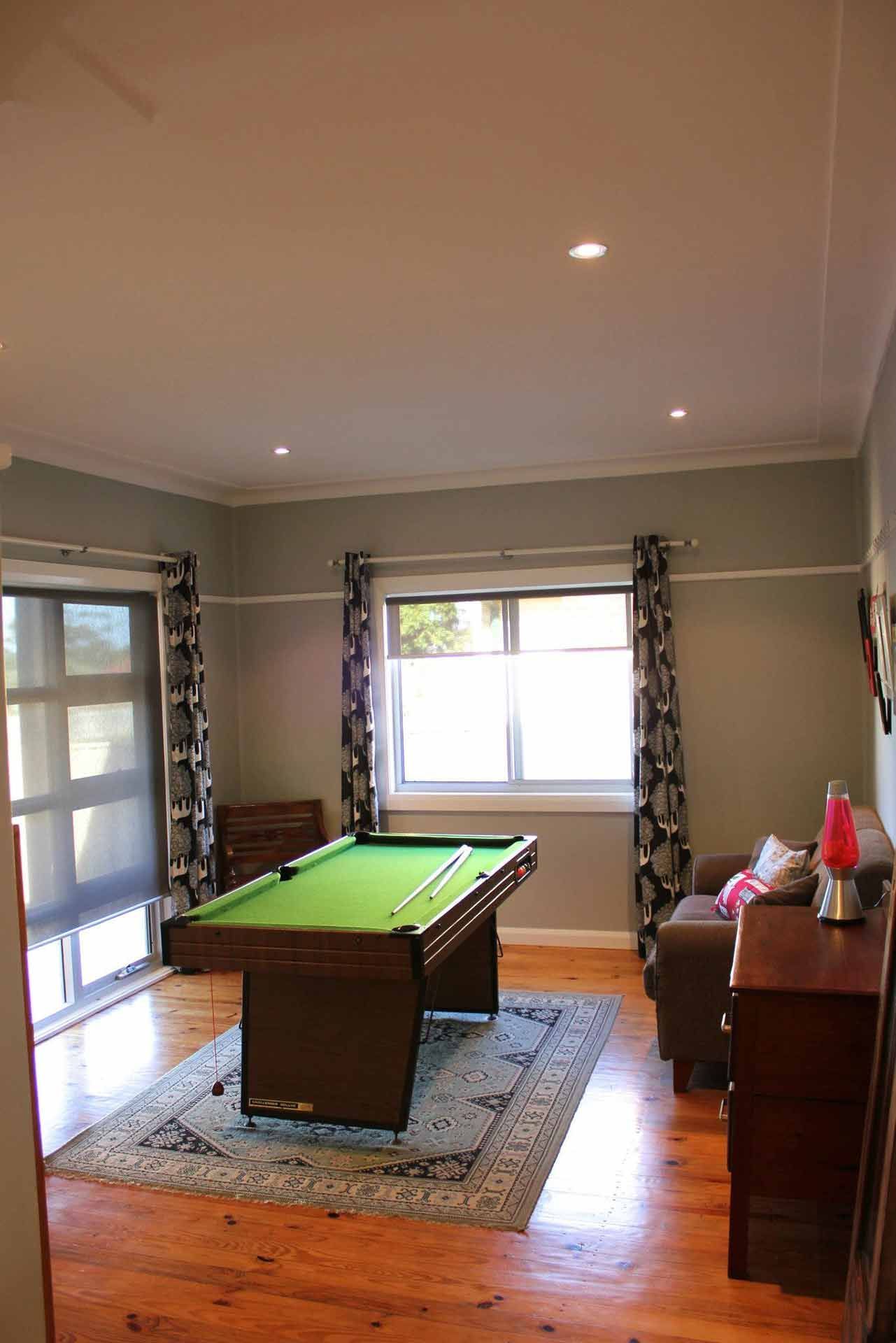 There is a Pool Table in the Middle of the Room — Craig Allman Construction Pty Ltd In Wollongong, NSW