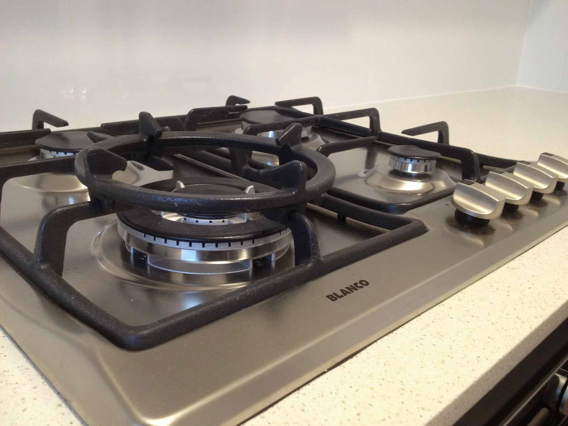 A Stainless Steel Stove Top With the Word Blanco on It — Craig Allman Construction Pty Ltd In Fernhill, NSW