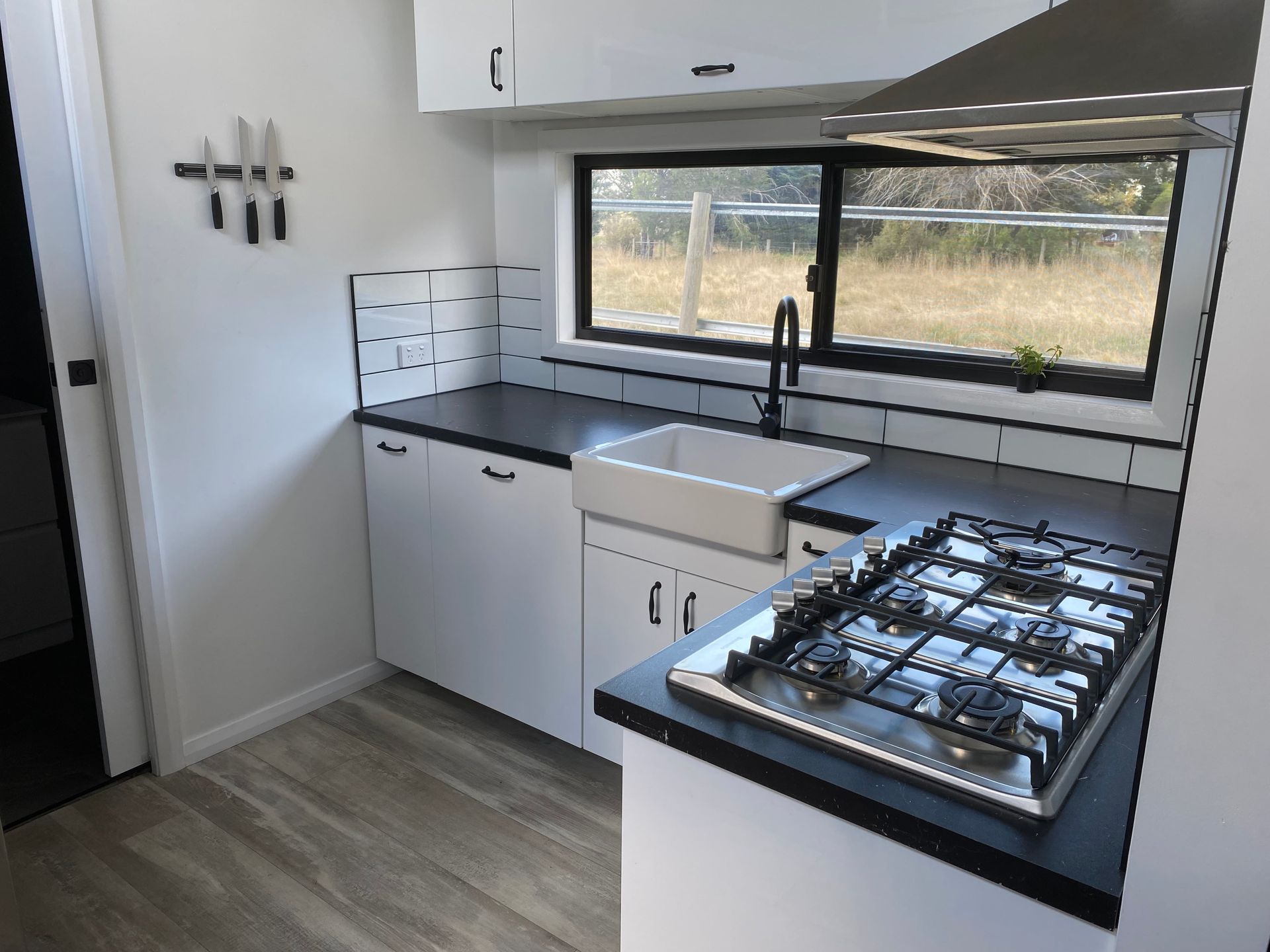 Kitchen With A Stove Sink And Window — GTH Living In Geelong, VIC