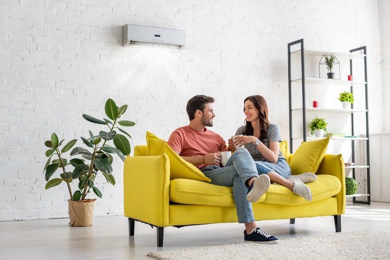 Couple Sitting in the Couch — Jacksonville, FL — Willman Air
