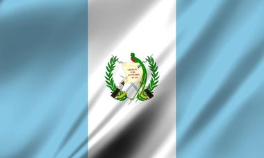 Guatemalan flag with blue-white-blue vertical stripes and the national emblem in the center