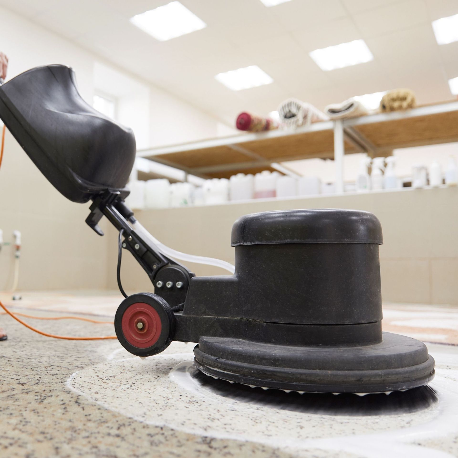 Arizona Carpet and Tile Steamers, Inc.- A person is using a steam cleaner to clean a carpet.