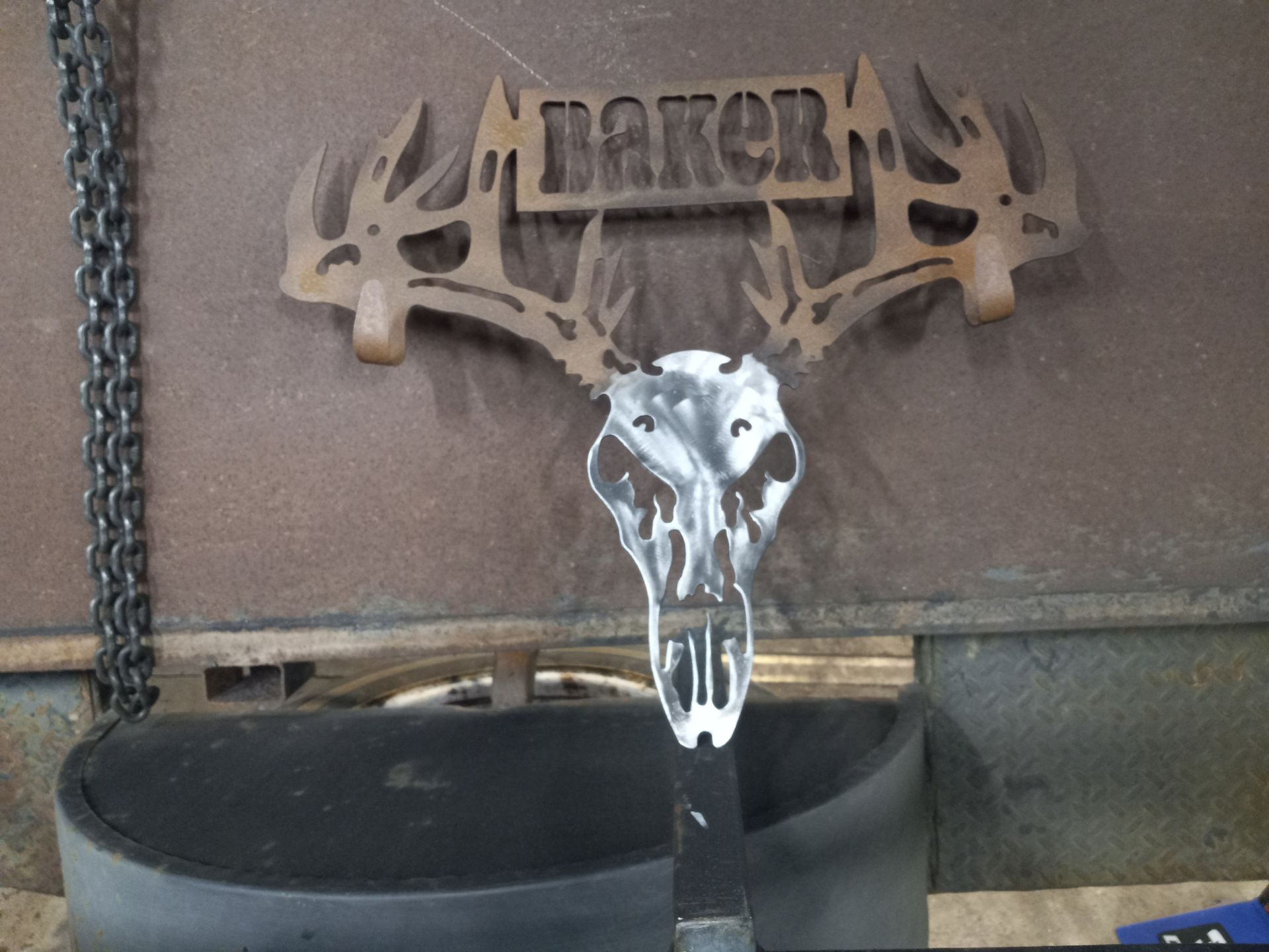 Metal deer skull and antlers,