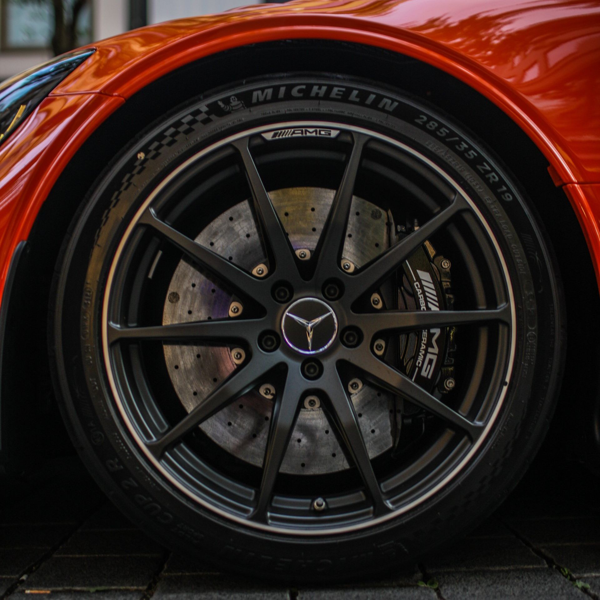 a close up of a michelin tire on a car
