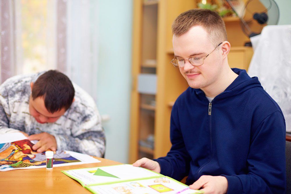 Man Engages In Self Study — Better Access Support Services In Warwick, QLD