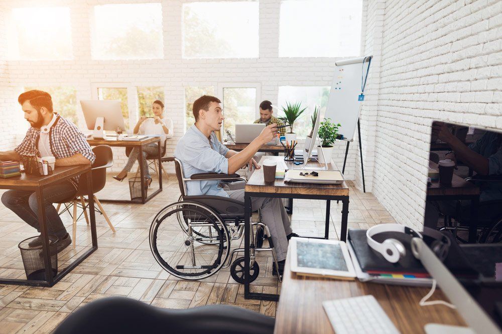 Man Working in an Office — Better Access Support Services In Toowoomba, QLD