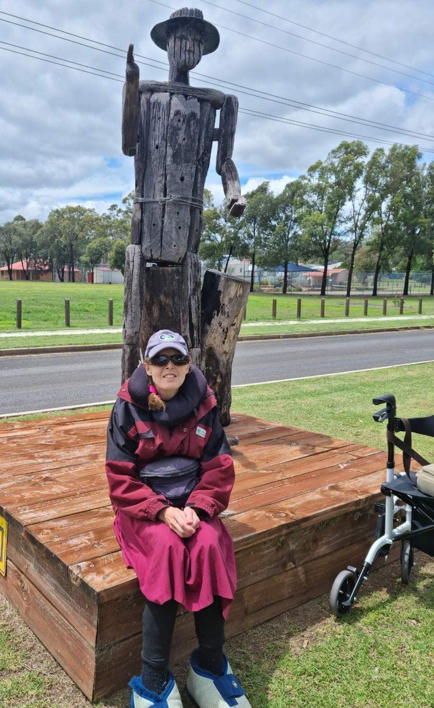 Woman Laughing While Being Pushed in Her Wheelchair — Better Access Support Services In Wyreema, QLD