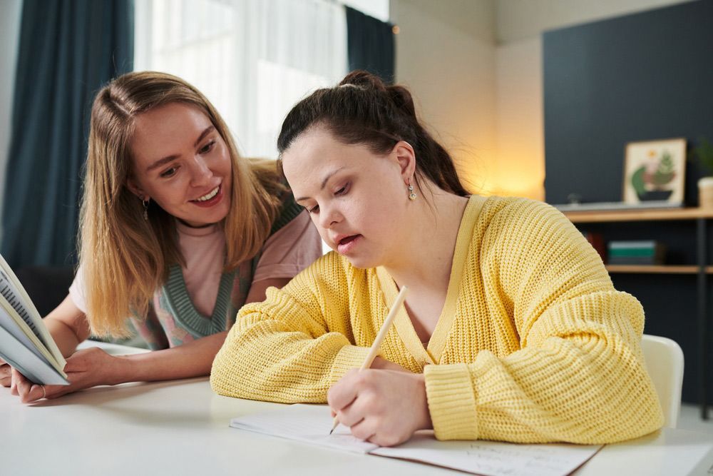 Support Coordinator Assisting a Young Girl