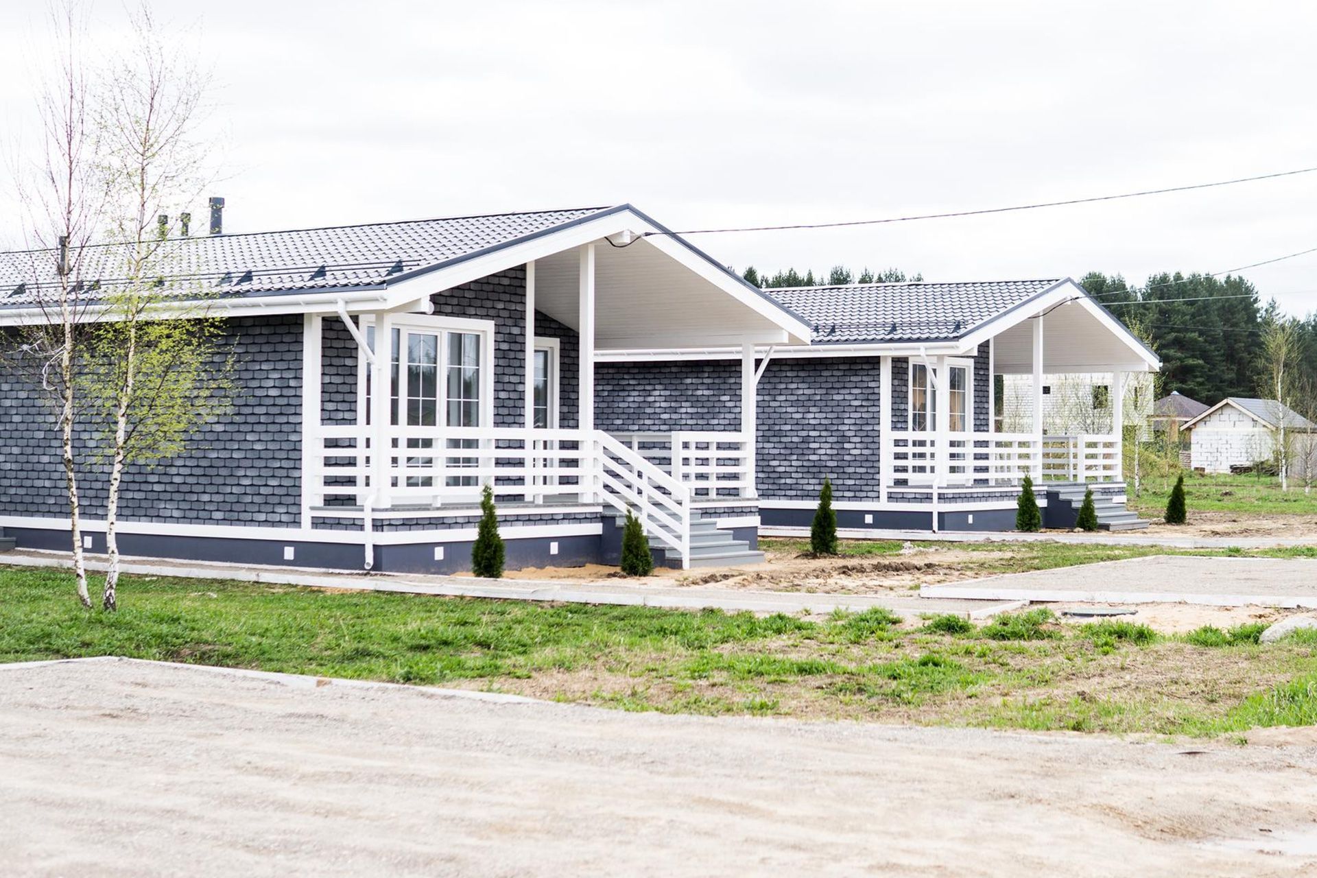 Inspector checking manufactured home foundation