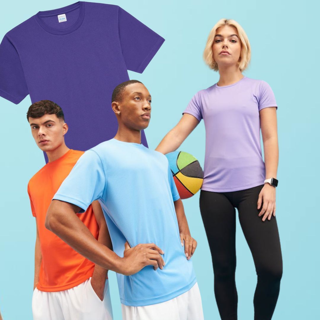 A man in a blue shirt is standing next to two other people