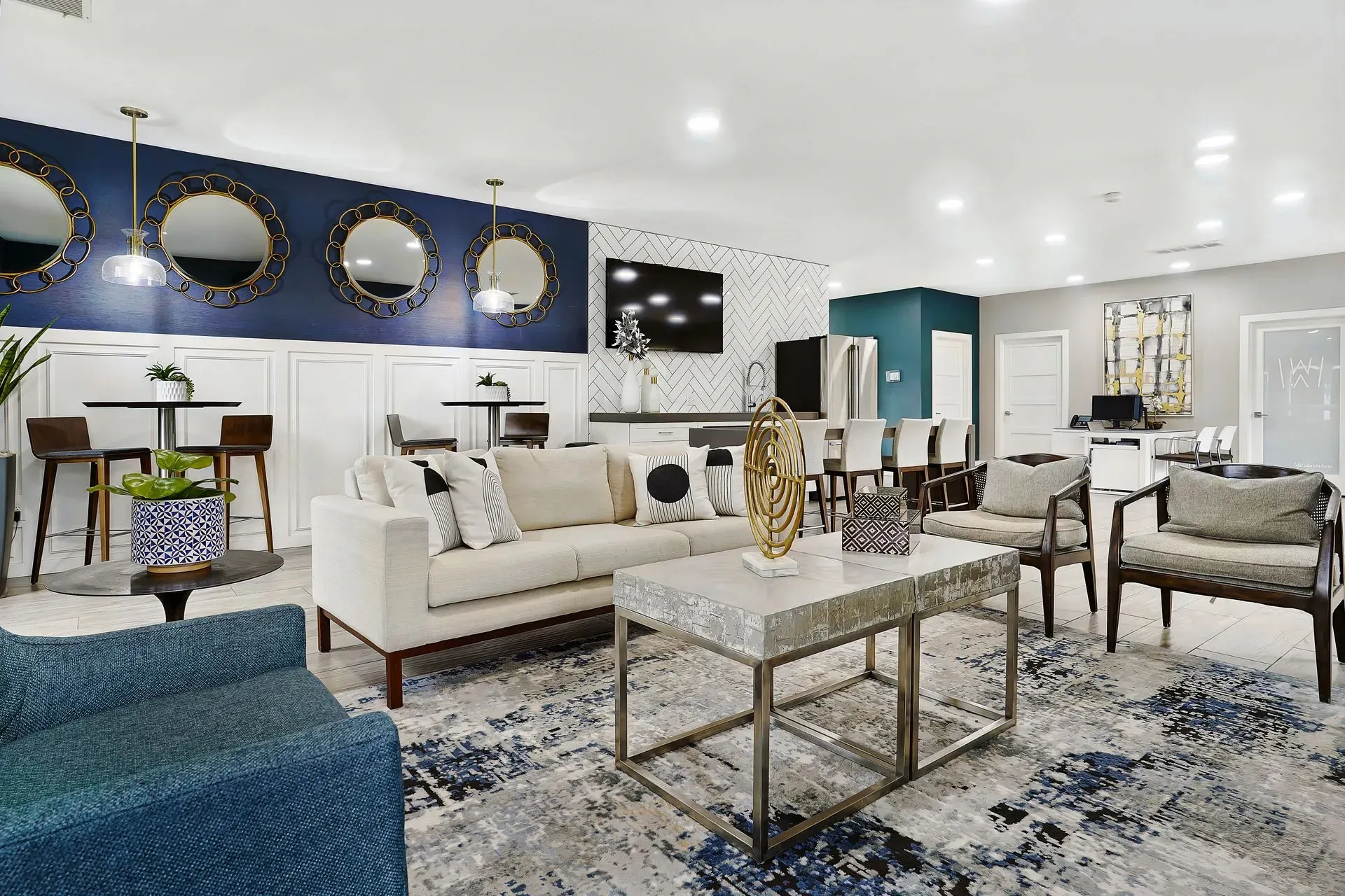 Stylish lounge area with comfortable seating, bar stools, and modern decor.