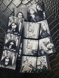 a bunch of black and white photos of people and skeletons on a table .