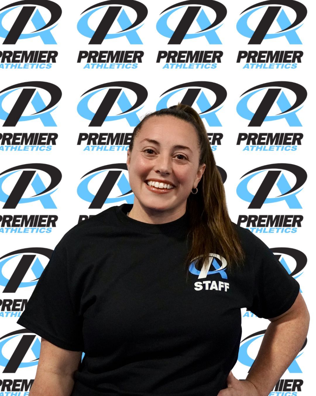 A woman wearing a black shirt with the word athlete on it