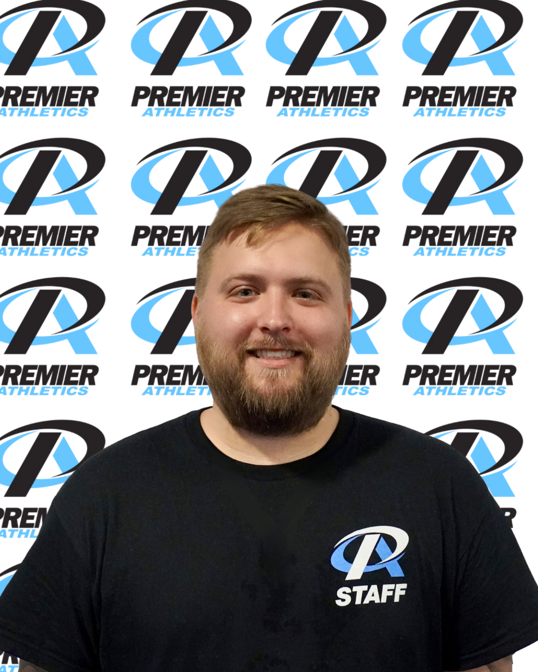 A man with a beard is wearing a black shirt with the word power on it