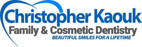 Logo for Christopher Kaouk Family & Cosmetic Dentistry with a blue heart shape and the