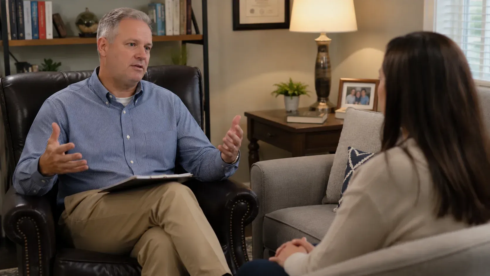 Male therapist explaining What Is EMDR Therapy and How Does It Help Process Trauma?