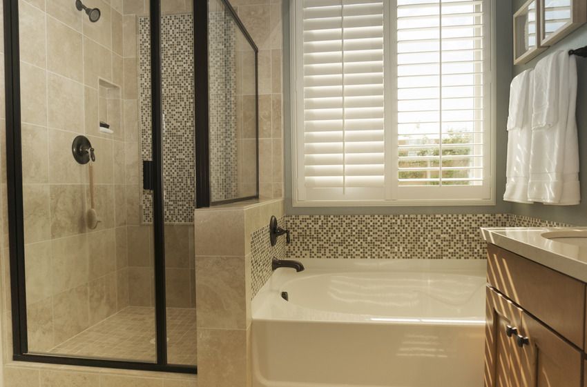 A Bathroom With a Tub , Sink , Shower and Window — Mi-ekka Designs in Bowen, QLD