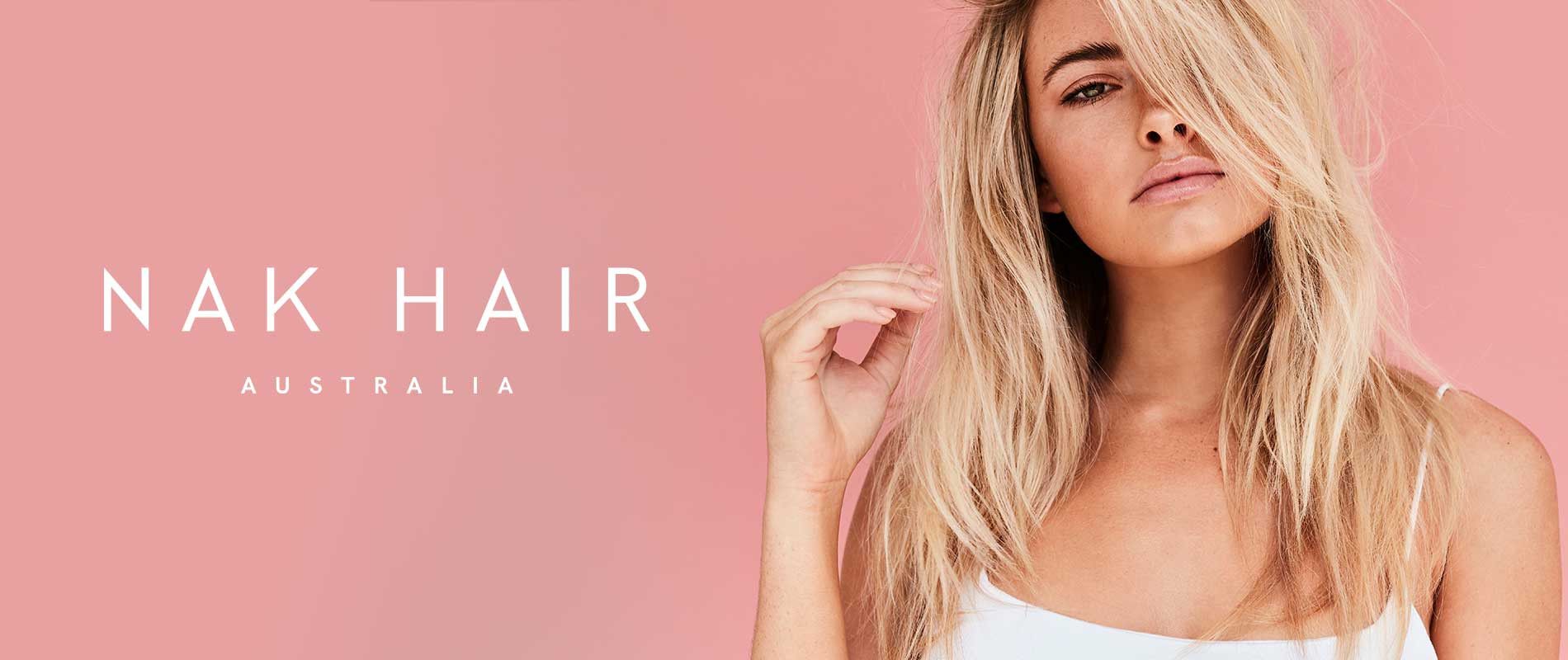 A Woman Is Getting Her Hair Done In A Salon — Cut Loose Haircare Outlet In Lismore, NSW