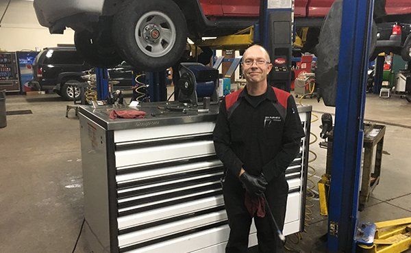 Happy Mechanic — Fort Wayne, IN — Summit Transmission Inc Happy Mechanic — Fort Wayne, IN — Summit Transmission Inc
