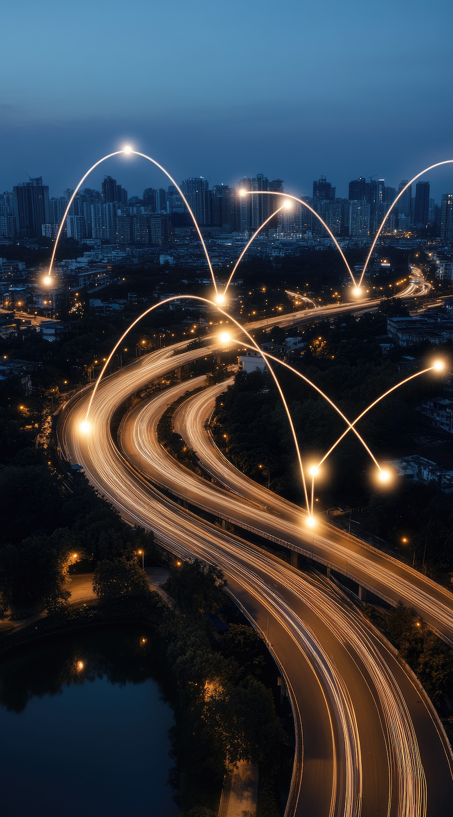An aerial view of a highway at night with lights connected to each other.