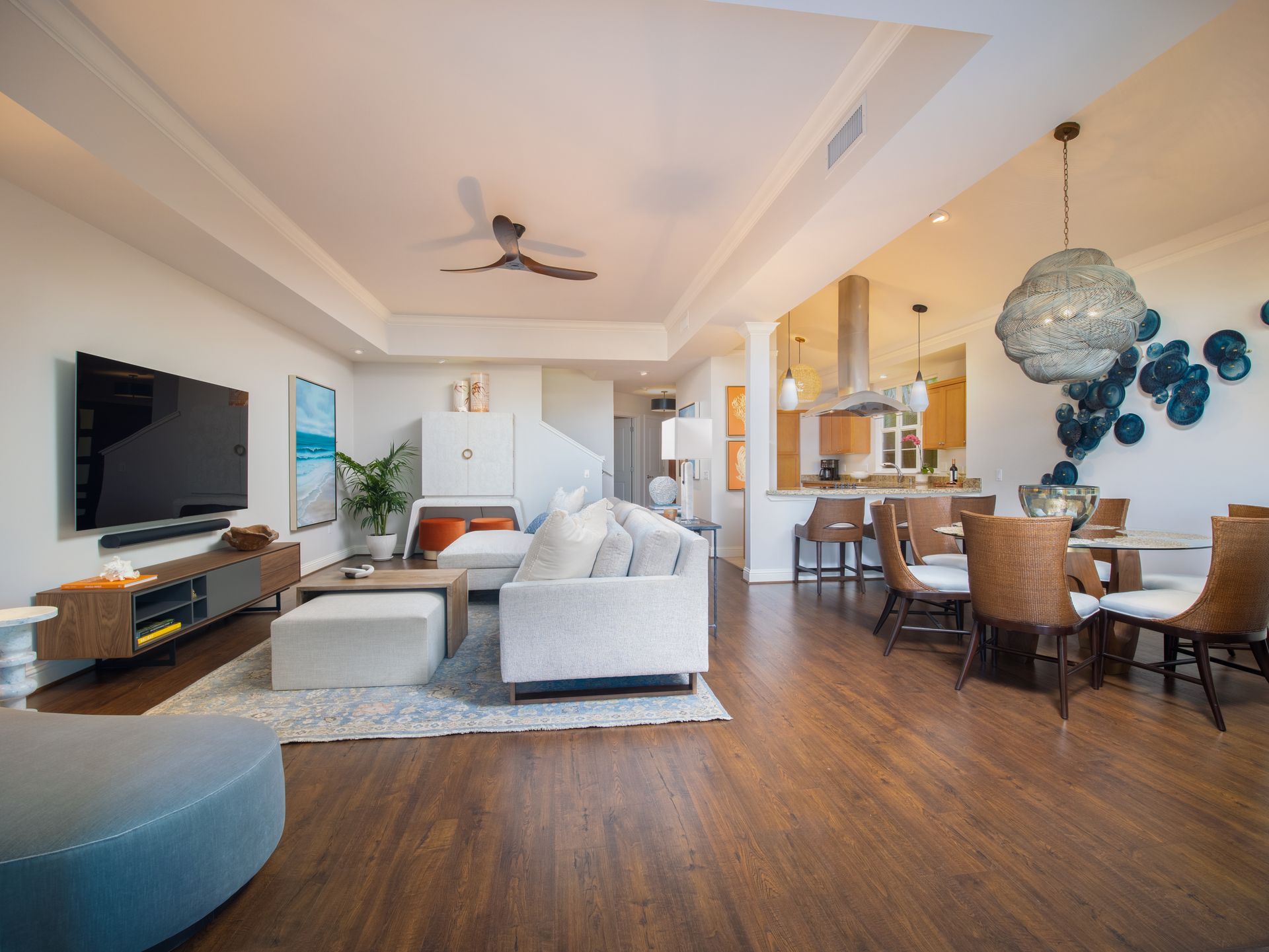 A living room filled with furniture and a flat screen tv.